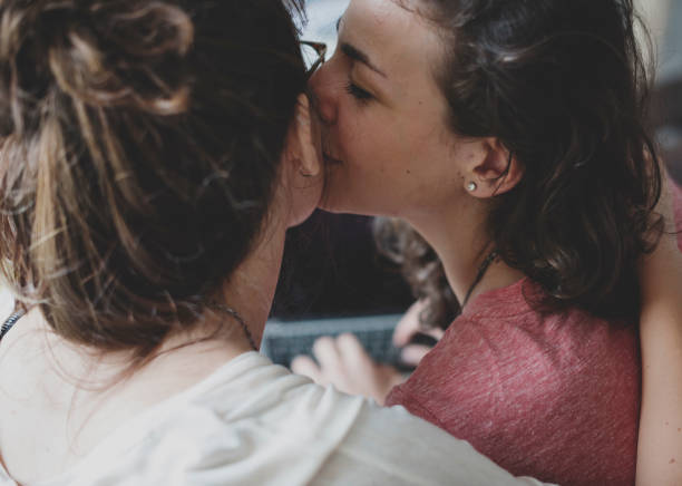 istock Lesbian Couple Together Indoors Concept 809629312