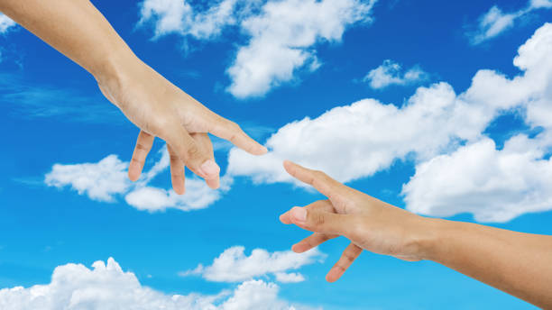 istock Hand pointing finger together with ,on blue sky and white clouds background 809668604