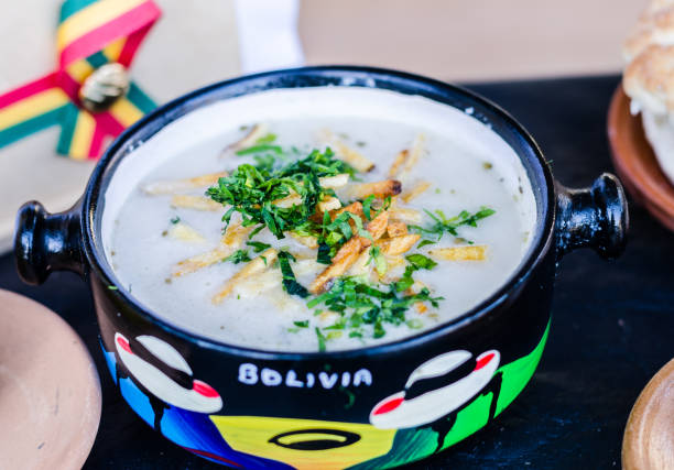 Traditional Bolivian cream peanut soup at a street food market stock photo