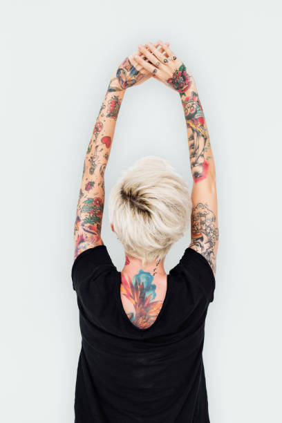 istock Woman rear view with tattoo on white background 809686810