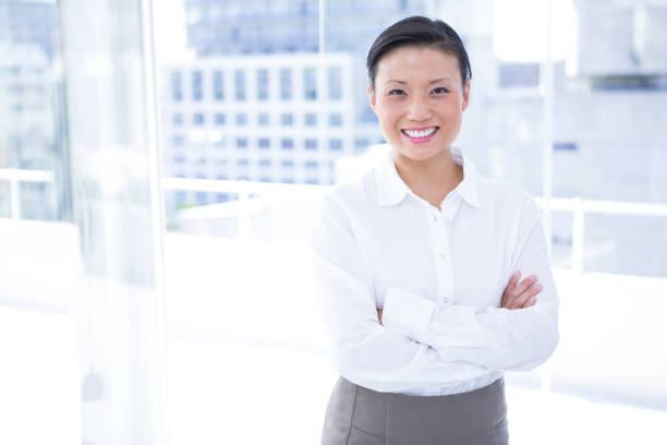 istock Businesswoman smiling at the camera 809693366