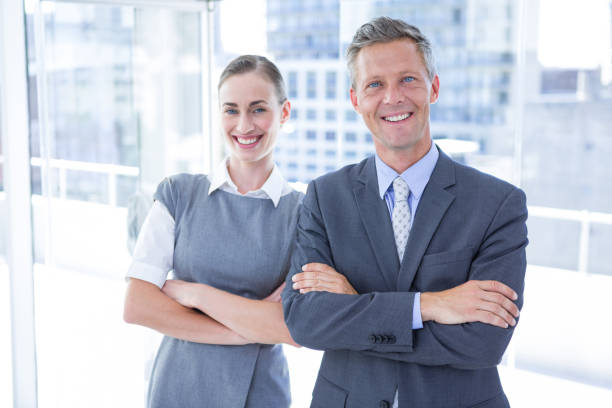 istock Business colleagues smiling at the camera 809694334