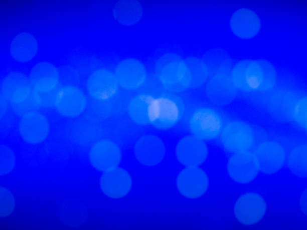 istock abstract bokeh. Blurry or defocus background of light spot, star and night sky 809700272