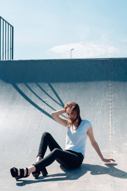 istock beautiful young girl posing on the playground 809732058