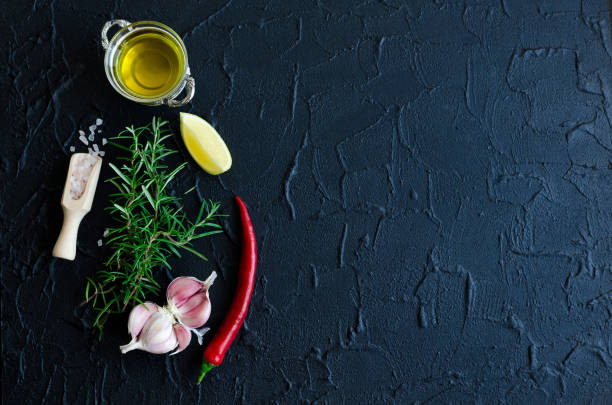 istock Rosemary, garlic, lemon, chili pepper and olive oil 809789614