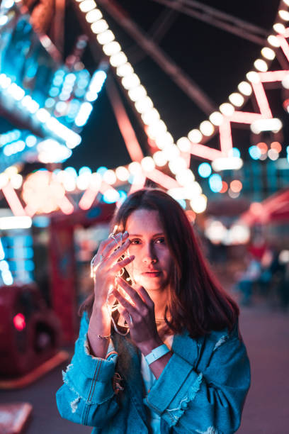 istock Girl in an amusement park 809789694
