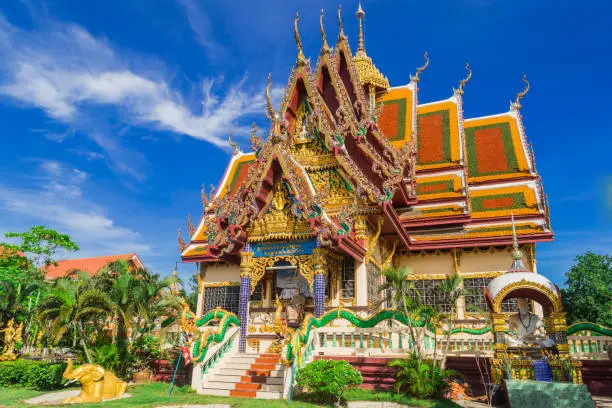 Photo of Wat Plai Laem temple. Samui, Thailand Landmark. Scenic View Of Buddhist Pagoda. Temple Complex Wat Phra Yai. Oriental Architecture. Landscape Background