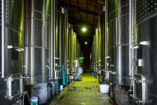 metal wine barrels in a winery