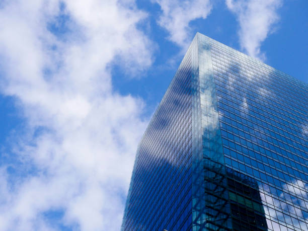 istock Osaka urban landscape and building reflecting blue sky and clouds 809817818