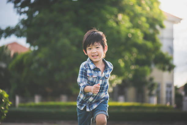 istock Asian child playing in the park 809822242