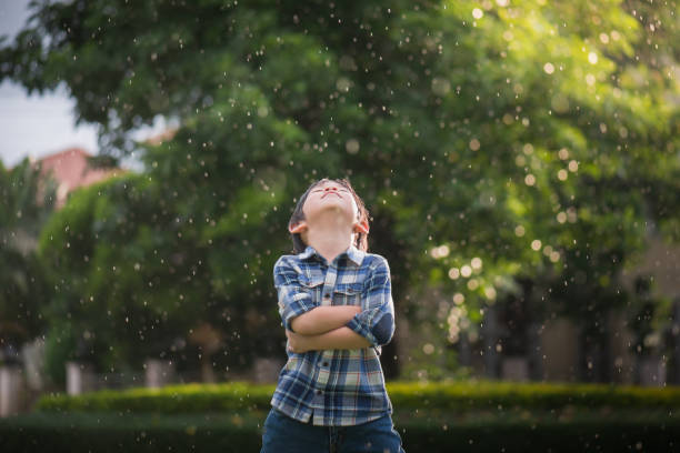 istock Cute Asian child looking up 809822292