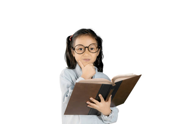 istock Clever girl daydreaming on studio 809822928