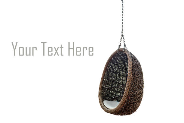 rattan lounge hanging chair with white pillow isolated on white background