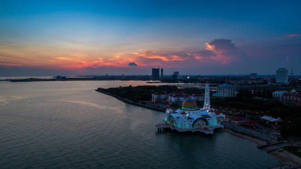 istock Selat Melaka Mosque aerial view during sunset 809853086