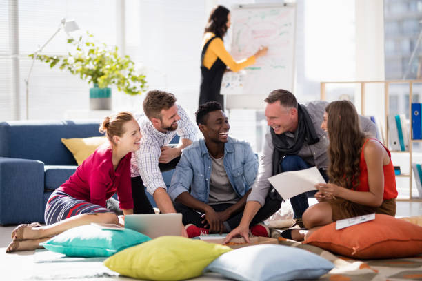 istock Business colleagues having pizza together while working in office 809859814