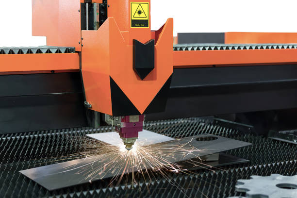 istock Cutting of sheet metal process. Sparks fly from laser by automat 809864714