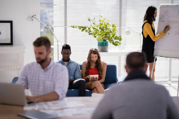 istock Business colleagues working in the office 809869148