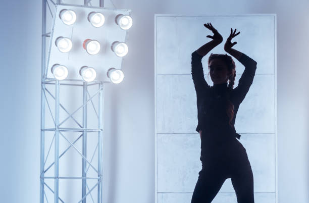 istock Female Silhouette Dancing Sexy Dance 809887592