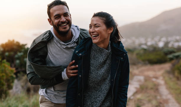 istock Couple enjoying vacation in countryside 809888640