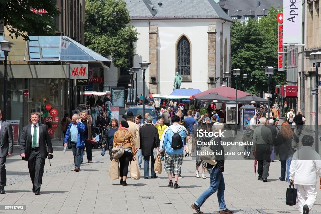 Essen, Germany People shop downtown in Essen, Germany. Essen is a city of almost 600 thousand citizens and was the 2010 European Capital of Culture. Architecture Stock Photo