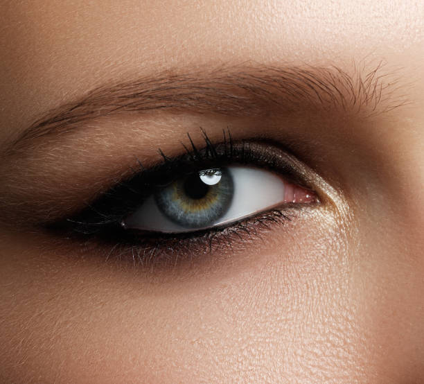 istock Creative eye makeup. Fashionable smoke eyes. Cosmetics and make- 809917798