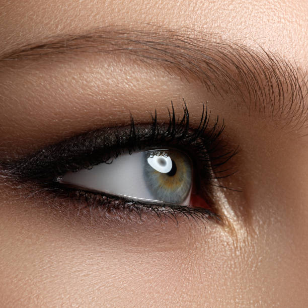 istock Creative eye makeup. Fashionable smoke eyes. Cosmetics and make- 809917834