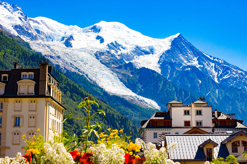 Beautiful view of Alps. Chamonix-Mont-Blanc, more commonly known as Chamonix, is a commune in the Haute-Savoie département in the Auvergne-Rhône-Alpes region in south-eastern France. It was the site of the first Winter Olympics in 1924. Chamonix is one of the oldest ski resorts in France.