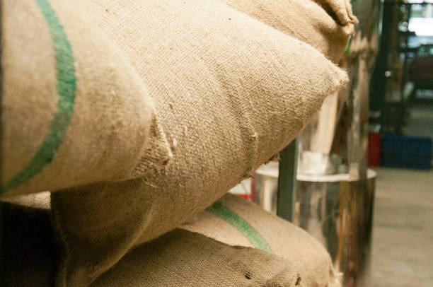 istock Bags in the warehouse on the racks. Coffee, arabica, rice. 809933002