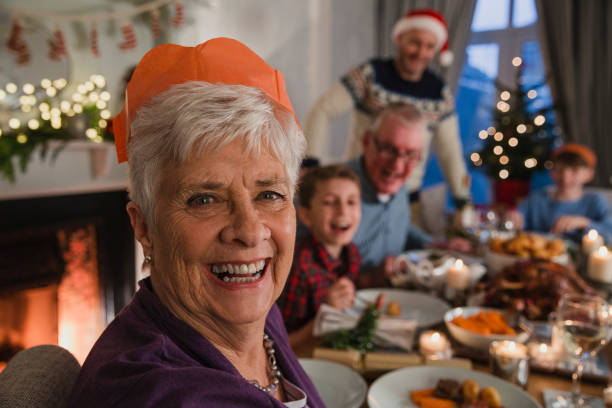Happy Grandmother At Christmas Dinner