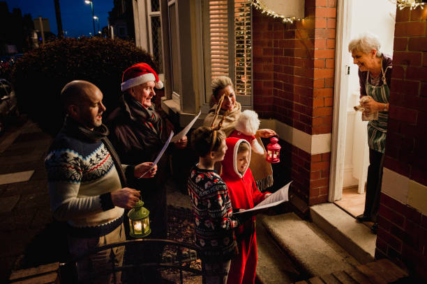 family carol singing - image singing fun vacations imagens e fotografias de stock