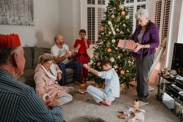 istock Opening Presents On Christmas Morning 809939782