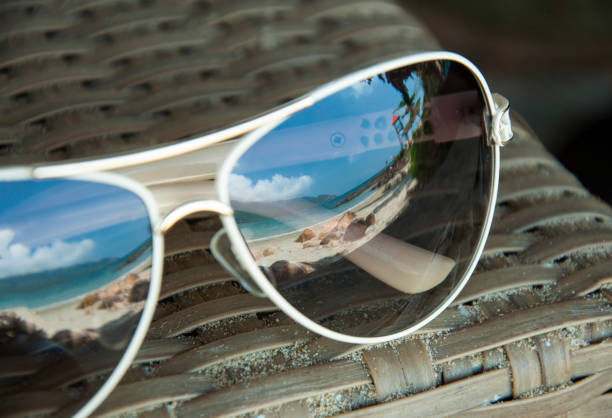 istock Reflection of a beautiful sea beach in sunglasses. 809939910