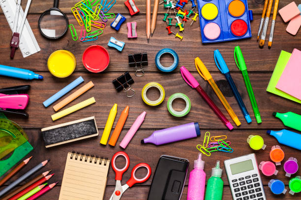 istock School or office supplies on rustic wooden table 809940050