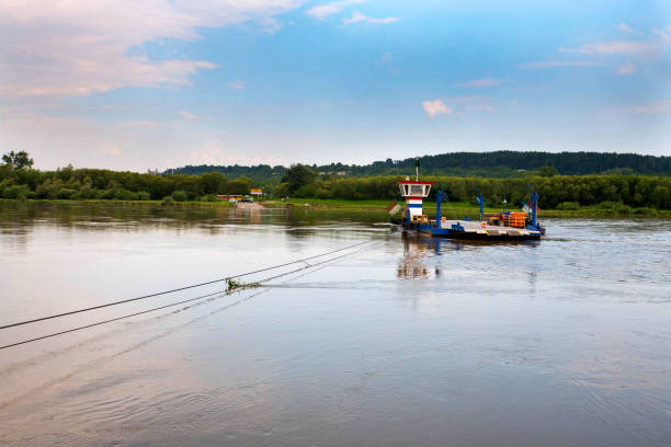 Ferry crossing on the Vistula River in Kazimierz Dolny Ferry crossing on the Vistula between Kazimierz Dolny and Janowiec janowiec poland stock pictures, royalty-free photos & images