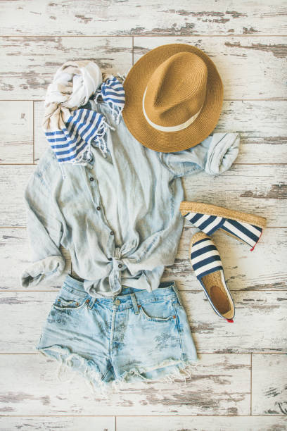 istock Summer outfit flatlay, parquet background, top view 809943878