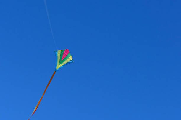 istock A kite flies in a clear and blue sky 809947852