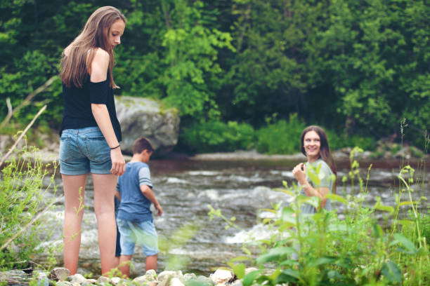 istock Teenagers going to the river 809958580
