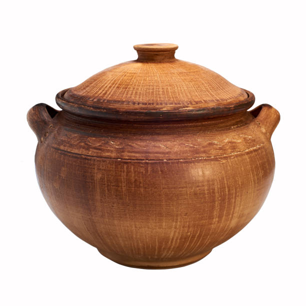 istock Monochrome ceramic handmade pot with a lid. Isolated on a white background 810031486