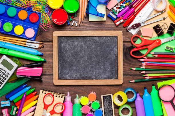 istock School or office supplies frame on rustic wooden table 810037798
