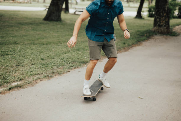 istock Unrecognizable skater boy skateboarding at the park 810055982