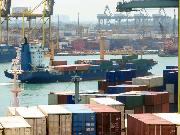 istock Container ship in port at container terminal. Ships of container ships stand in terminal of port on loading, unloading container 810067346