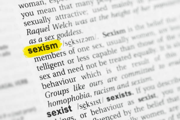 Highlighted English word "sexism" and its definition Highlighted English word "sexism" and its definition at the dictionary. role reversal stock pictures, royalty-free photos & images