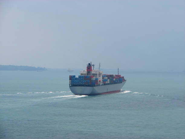 istock A large merchant ship container vessel in coastal waters of ocean. A merchant ship is moving around sea in daytime 810071908