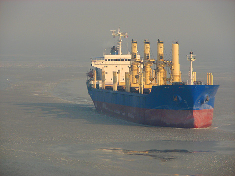 Dry cargo ship in the sea, ocean.