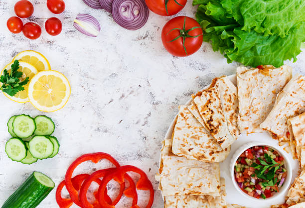 istock Quesadilla with chicken and corn on white background. Top view. 810099038