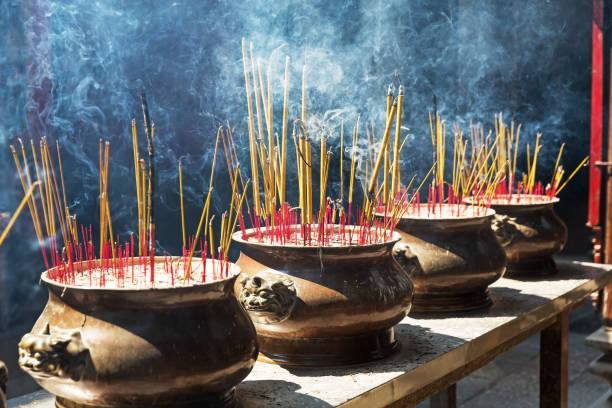 istock burning of red candle at chinese temple 810107868