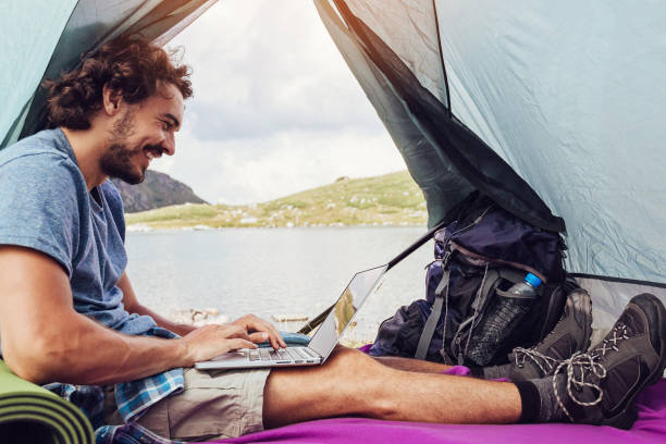 istock Surfing the net high in the mountain 810113394