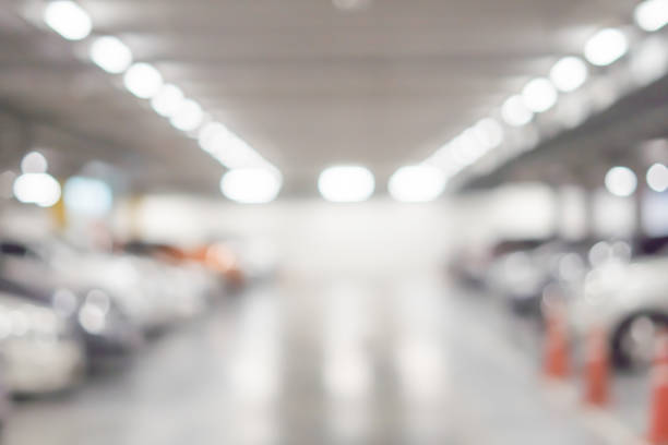 istock Abstract blur parking car indoor for background 810118000