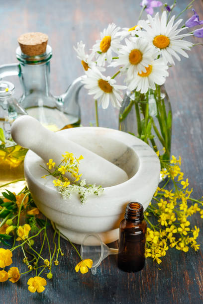 istock Essential oils and wild flowers 810130858