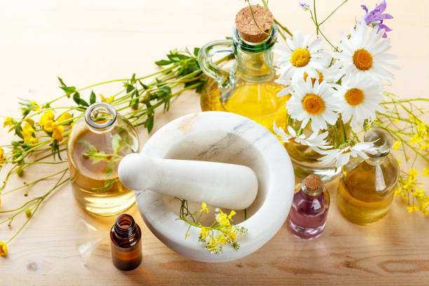 istock Essential oils and wild flowers 810133774